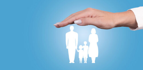 Family life insurance, family services and family support concepts. Woman’s hand with protective gesture over family icon. Copy space.